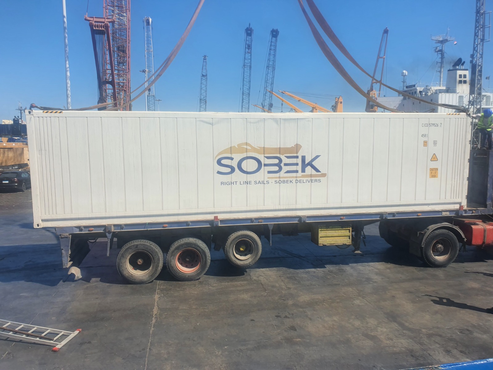 Sobek container secured on a port trailer